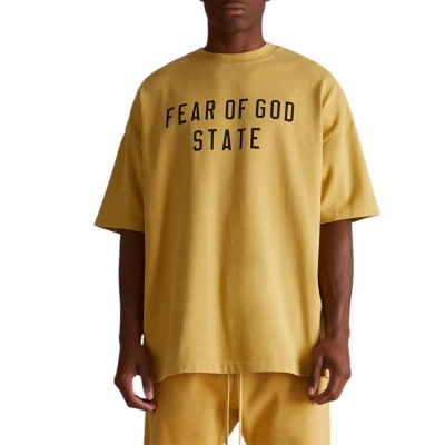 Foto van Fear Of God T-shirt Geel Jersey Amber