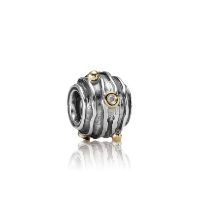 Foto van Pandora 790209D abstract silver charm, met 14 crt goud, 0.03ct TW h/vs diamanten