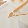Afbeelding van SONGMICS - Houten kledinghangers - set van 20 - antislip, draaibare haak, natuurlijke kleur