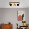Afbeelding van BRILONER Barnim - Opbouwspot - Plafondlamp met houten en metalen spots - Zwart en goud