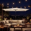 Afbeelding van Outsunny Terrasparasol van polyester en metaal - 289L x 198B x 248H cm - Crème wit