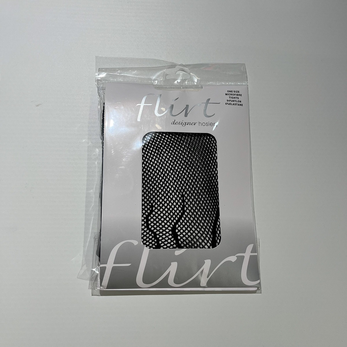Flirt | Zwarte fishnet panty met vlammen motief