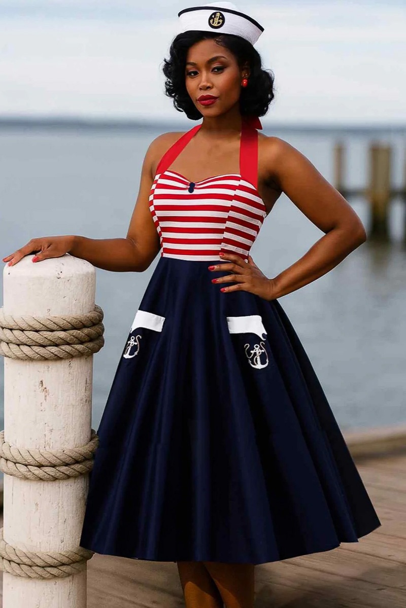Dolly and Dotty | Daisy nautical vintage halterswing jurk met gestreepte top en blauwe rok met anker Dolly and Dotty | Daisy nautical vintage halterswing jurk met gestreepte top en blauwe rok met anker