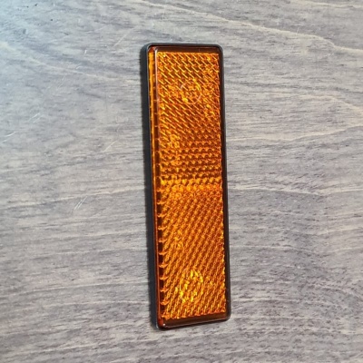 Reflector zijkant oranje Revival / Streetmate origineel Foto van Reflector zijkant oranje Revival / Streetmate origineel