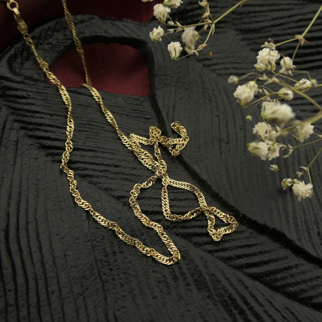 Gouden Gedraaide Schakel Ketting 52 Cm Juweelwinkel nl gouden-gedraaide-schakel-ketting-52-cm-juweelwinkel-nl