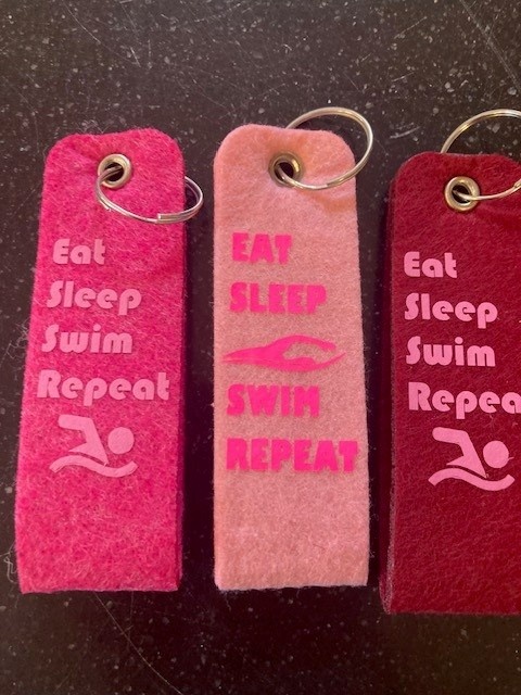 Sleutelhanger Eat Sleep Swim Repeat Roze